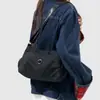 2026 Nuevo Modelo Bolso de Hombro Simple y Ligero de Tela de Nylon con Múltiples Compartimentos para Mujer, Bolso Cruzado de Viaje de Moda de Color Sólido Casual