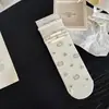 Nuevo estilo de otoño e invierno: Calcetines japoneses simples y versátiles de gato lindo hasta la mitad de la pantorrilla con lazo, calcetines de moda para mujer, suaves y cómodos