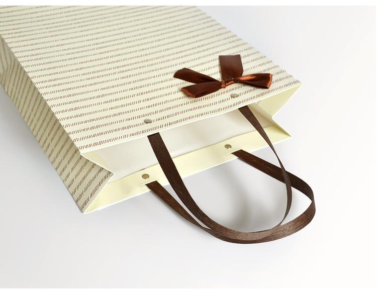 蝴蝶结手提袋_08