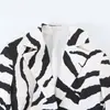 Moda femenina transfronteriza 2026: Estilo europeo y americano, casual, asimétrico con estampado de cebra, blazer elegante para mujer, B130091