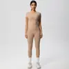 Conjunto deportivo de dos piezas para mujer, pantalones deportivos de tiro alto, ajustados, manga corta, estilo 'scrub' europeo y americano, para yoga