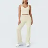 Novo conjunto de yoga feminino com blocos de cor estilo europeu e americano, alças cruzadas nas costas, justo, perna larga, adequado para esportes, corrida e fitness