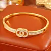 Pulsera de Moda en Forma de C para Mujer, Lujo Ligero Versátil Estilo Pandora de Gama Alta No Descolorante Pulsera de Doble Anillo H al por Mayor