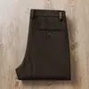 Estación europea otoño e invierno algodón modal sarga microelástico simple negocios lavado cintura media ajuste recto pantalones casuales para hombre