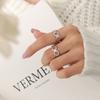 Anillo de trémolo de estilo francés con nicho de apertura hueca geométrica de 8 caracteres que no se desvanece, anillo de cola para hombres y mujeres A313