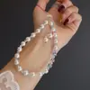 Nuevo Encanto para Teléfono con Perlas de Concha y Cristales, Estilo Dulce y Fresco, Encanto de Muñeca de Atmósfera de Gama Alta de Nicho para Bolsos