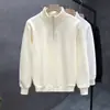 Suéter de cuello alto con media cremallera color liso diseño de nicho sentido de la moda tendencia canalla guapo joven otoño e invierno nuevo suéter para niños tendencia