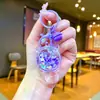 Llavero de Tortuga Luminosa Rellena de Aceite con Tortuga de Cristal Colgante de Arena Movediza Encanto de Regalo Pequeño Decoración para Bolso de Pareja Regalo
