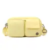 Nuevo monedero impermeable de nailon transfronterizo estilo japonés con correa para el hombro, bolso de mujer de color liso, bolsa de almacenamiento cruzada ligera e informal