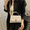 Bolso de Mano Cuadrado Pequeño con Textura de Moda 2025 Bolso Casual Nuevo para Mujer de Hombro Axila Bolso Cruzado de Color Puro Francés