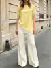 Moda de verano cruzada europea y americana 2026, nueva camiseta de manga corta para mujer con empalme de satén y encaje francés, top adelgazante
