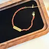 Pulsera de Hilo Rojo con Monedas de Cinco Emperadores Estilo Chino Nuevo Dorado para Mujer, Exquisito Accesorio de Mano Versátil que Atrae la Riqueza para Año Nuevo