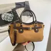 Bolso de Hombro Patchwork Moda Retro para Mujer 2026 Nuevo Estilo Sensación Relajada Gran Capacidad Versátil para el Viaje Diario Tote