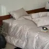 Juego de Cuatro Piezas de Algodón de Fibra Larga Xinjiang 100s Lujo Ligero Sensación de Alta Gama Algodón Puro Alto Recuento de Hilos Todo Algodón Satén Jacquard Funda Nórdica Ropa de Cama