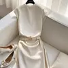 Conjunto de Ropa de Verano con un Estilo Sofisticado y Elegante: Un Top de Camiseta de Cuello Redondo y una Falda Bodycon Traje Profesional para Mujer