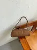 Bolso de axila francés de nicho transfronterizo para mujer, nuevo modelo de moda, lujo ligero, bolso baguette retro, bolso de hombro para ir al trabajo, bolos