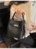 Bolso Cubo Simple y Elegante para Mujer 2026 Nuevo Bolso de Hombro Retro de Nicho Bolso Cruzado Casual para el Día a Día