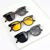 Óculos de sol personalizados Double M de novo estilo coreano, lentes oceânicas de cor clara, óculos de armação preta, óculos de sol infantis da moda