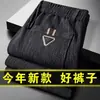 Venta directa de fábrica pantalones casuales para hombre invierno más terciopelo gruesos de pana pantalones de pana para hombre mediana edad sueltos pierna recta pantalones de pana