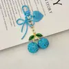 Venta Caliente Transfronteriza Llavero de Fruta Cereza Corazón de Lazo Full Diamante Accesorio Colgante de Bolso de Moda Creativa para Niñas
