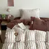 Conjunto de Roupa de Cama Quente Listrado de Inverno em Leite de Pêssego Conjunto de Quatro Peças Capa de Edredom em Fleece Coral Dupla Face Lençol de Flanela com Elástico Conjunto de Três Peças