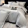 Juego de cama de cuatro piezas de satén de algodón de fibra larga de alta densidad y alto número de hilos, clase A, con bordado exquisito y sábana bajera de algodón puro