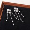 Japonês e coreano Pearl Flower Chain Tassel Prata Pin Brincos Mulheres Super Imortal Brincos Únicos Geométrico Diamante Brincos Distintivos