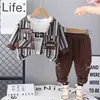 Fabricantes Mayoristas de Ropa de Primavera de Manga Larga para Niños Transfronterizos Conjunto de Tres Piezas Cardigan Rayado Elegante para Niño Nuevo Estilo Primavera y Otoño 2025