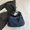 Bolso de mano de otoño para mujer, estilo informal, artístico, de lona de gran capacidad, resistente al desgaste, con textura vaquera.