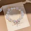 Pulsera de perlas con lazo de doble capa estilo vintage francés, diseño único y versátil, joyería de lujo ligero y de alta gama