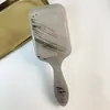 Bolsa de aire amarilla transfronteriza Europa y Estados Unidos peine onda de agua lámina acrílica peine de cojín de aire forma de mujer peine masajeador peine para cabello rizado