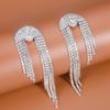 Joyería Pendientes con borlas exageradas Accesorios Venta al por mayor Fábrica de mujeres Pendientes de diamantes de imitación Joyería de sentido avanzado Nuevo suministro transfronterizo