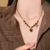 Collar de piedra Ojo de Tigre para mujer 2025 nuevo popular retro superpuesto cadena para clavícula cadena para suéter de otoño e invierno pequeños accesorios medievales