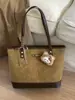 Bolsa Tote de Grande Capacidade Coreana para Mulheres 2025 Nova Bolsa de Ombro para Roupas de Trabalho Diárias Bolsa de Mão Versátil Bolsa de Aula para Estudantes