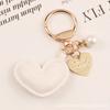 Nuevo Colgante Llavero Corazón de Cuero Aleación Creativo Colorido Corazón de Durazno Perla Accesorios Pequeña Decoración de Bolso Fresca