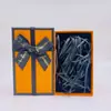 2025 Año de la Serpiente Tendencia Nacional Creativo Pequeña Serpiente de la Suerte Llavero Caja de Regalo Lindo Bolso Llavero Colgante Venta al por Mayor Pequeños Regalos