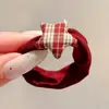 Coloridos coleteros de nuevo estilo 2026, versátiles y dulces, con accesorios de M&M's, anillos de toalla, diseños de dibujos animados y un estilo fresco y lindo, perfectos para accesorios para el cabello de niños