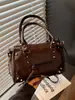 Bolsos transfronterizos 2026 otoño e invierno estilo motero vintage de gran capacidad bolso de mano bolso tote pequeño bolso cruzado de alta gama