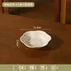 Un juego de cuencos y platos de cerámica delicados y elegantes, con colores bajo vidriado, adecuado para uso doméstico como cuencos, platos, tazones para arroz, tazones para sopa, tazones para fideos instantáneos y platos para servir