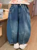 Pantalones de Sarga Bordados con Guadaña de Dibujos Animados Otoño Nuevo Transfronterizos 2026 Versión Coreana Pantalones Vaqueros Escolares para Niñas Ropa Infantil Moda al por Mayor