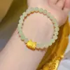 Pulsera año del dragón dumpling al vapor dragón original diseño de nicho femenino imitación dragón zodiaco jade Hetian nuevo pulsera para amigas estudiante