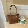 Estilo minimalista, bolso tote de mujer elegante y moderno, nuevo modelo 2026, bolso de hombro moderno y versátil para el trabajo y los desplazamientos