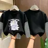 Camiseta de manga larga a rayas de algodón puro para niña, top elegante nuevo para niños 2026, camiseta interior de otoño de dibujos animados para niña pequeña