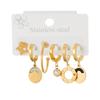 Aretes de acero de titanio chapados en oro para mujer, aretes de alta gama que no se desvanecen, aretes asimétricos vintage, aretes transfronterizos, aretes de estrellas