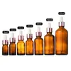 Em estoque frasco de essência de vidro marrom 5ml-100ml frasco conta-gotas de vidro frasco vazio de essência marrom escuro