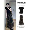 Conjunto de verano para mujer, chaleco sin mangas de cuello alto medio negro, nuevo estilo 2026, combinado con una falda para un atuendo de verano completo