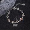 Pulsera de trébol de lujo ligero de estilo popular en línea transfronterizo europeo y americano para mujer, exquisitos accesorios de flor de hierba Tang INS