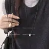 Colar Minimalista com Pingente de Gota d'Água e Fio Preto para Mulheres 2026 Novo Popular High-End Light Luxury Corrente Longa para Suéter Acessório