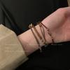 Serie marrón ~ Pulsera retro trenzada de cuerda con cuentas para mujer Otoño e Invierno 2024 Nuevo Estilo Étnico de Orquestación Pulsera Apilada