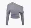 25 Suéter Assimétrico de Ombro Malha Solta Gola Caída Outono/Inverno + Calça Saia Plissada Tricô Flare